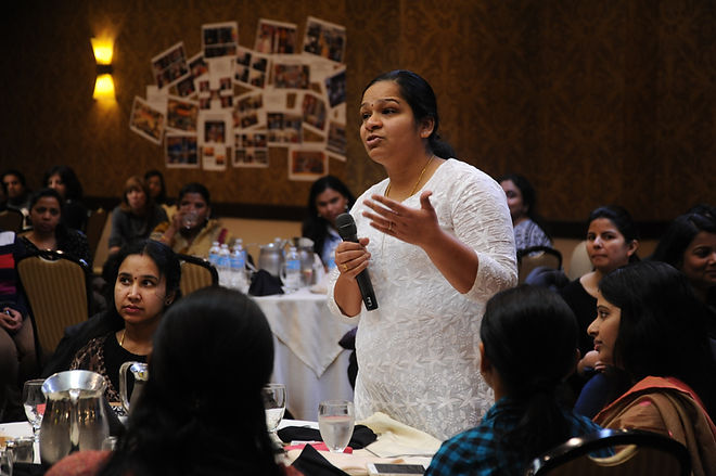 Someone speaking and using hand gestures